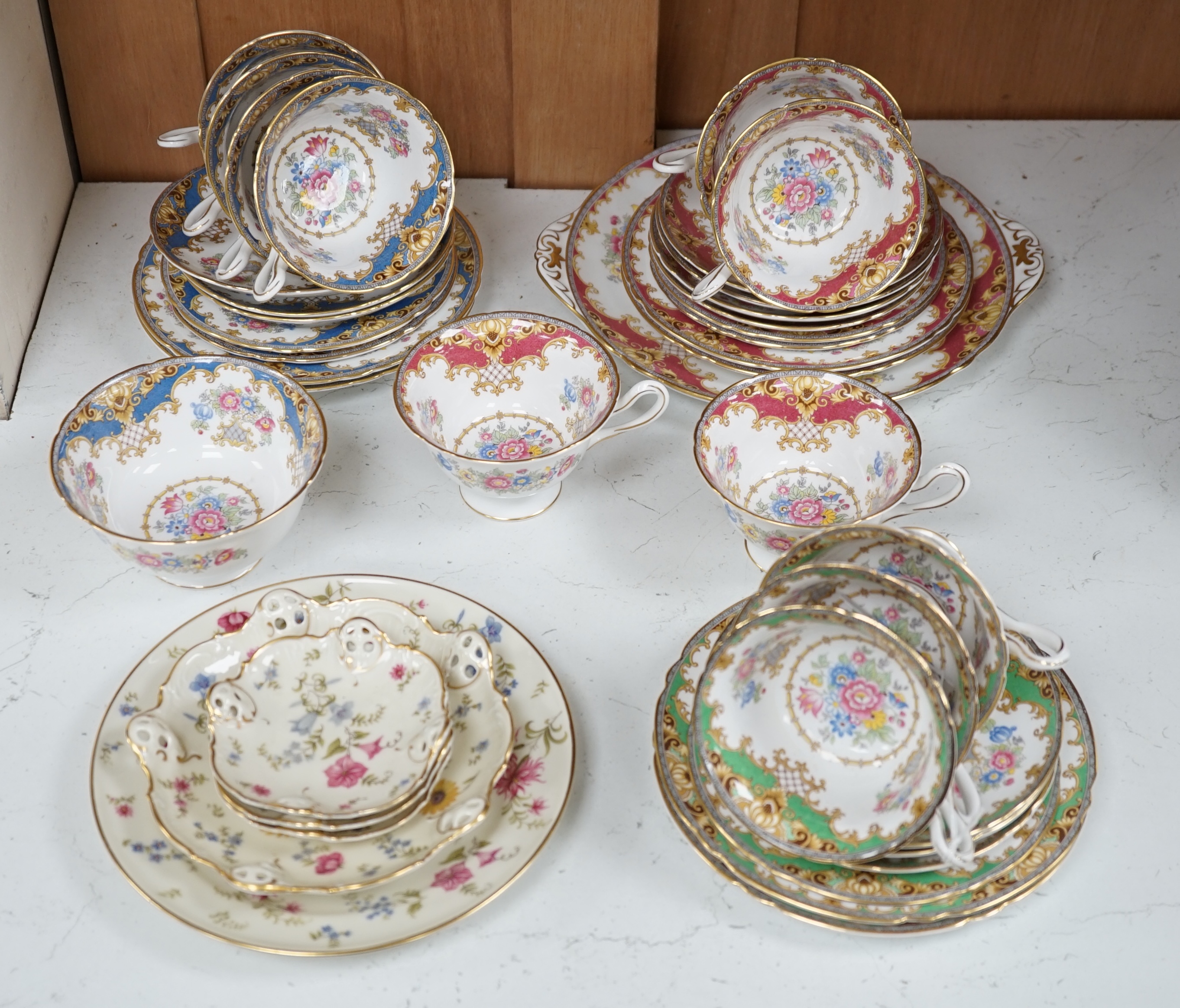 A Shelley harlequin part tea set in blue, green and pink, together with four Rosenthal dishes. Condition - good